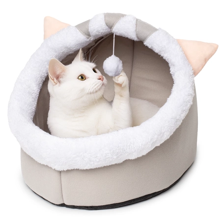 A soft house/bed for cats with a cat inside