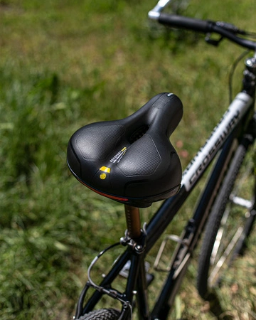 Siodełko rowerowe szerokie amortyzujące z odblaskami RS8 żółte