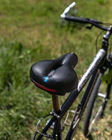 Siodełko rowerowe szerokie amortyzujące z odblaskami RS6 niebieskie