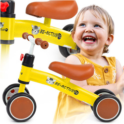 Rowerek biegowy dla dzieci żółty 4-kołowy jeździk na pierwsze urodziny